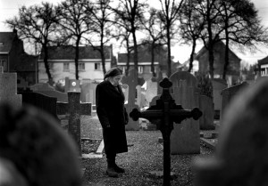 Emilienne by the grave of her husband